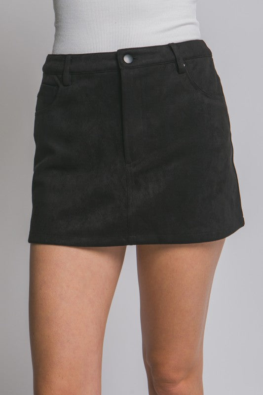 Faux suede mini skirt with pockets and belt loops.